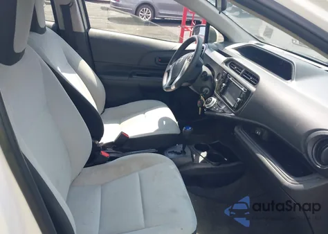 2015 Toyota Prius C One from USA, damaged, VIN JTDKDTB37F1094645